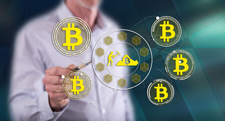 Man touching a bitcoin mining concept