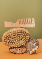comb and soap in the bathroom. still life with natural homemade soap. natural body care products in the bathroom. body brush and comb