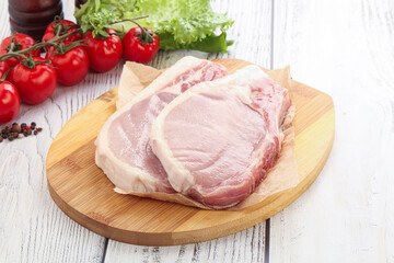 Raw pork t-bone steak for grill