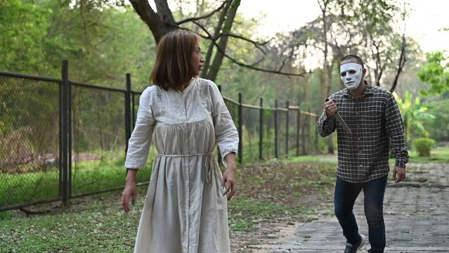 Scene of a psychopathic killer chasing a woman