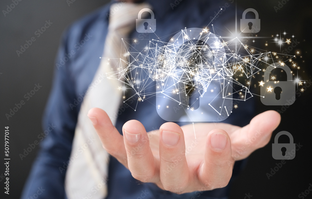 Aufkleber businessman holds a padlock that protects company and information data via a virtual network connect