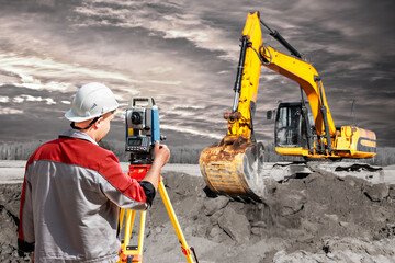 Surveyor engineer is measuring level on construction site. Surveyors ensure precise measurements...