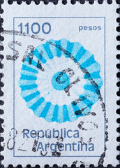 ARGENTINA - CIRCA 1981: a postage stamp from ARGENTINA, showing the emblem of a National cockade. Circa 1981