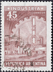 ARGENTINA - CIRCA 1962: a postage stamp from ARGENTINA, showing a petrochemical plant. Circa 1962