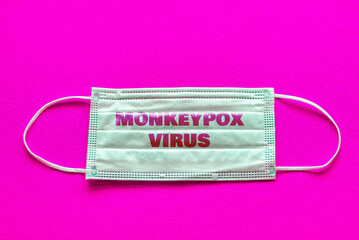 Monkeypox outbreak concept.Inscription monkeypox virus on medical face mask.Virus transmitted to...