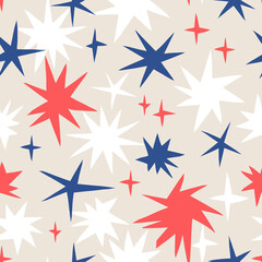 Festive night sky stars blue red white cutout shapes vector seamless pattern. Matisse inspired celestial background. Merry Christmas Happy New Year Holiday season print for gift wrapping paper.
