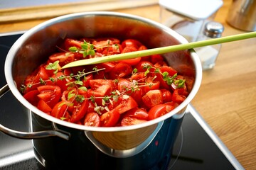 sliced tomatoes in a cooking pot