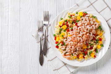 shrimps and millet pilaf with mango and veggies
