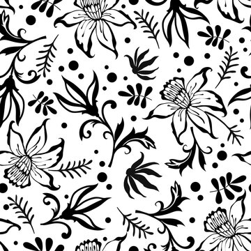Floral seamless background. Abstract black flowers on a white background.