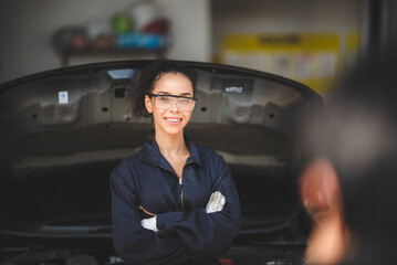 professional African American mechanic woman portrait, auto car repair and service workshop service job by adult African female technician person in industry of engine or vehicle occupation automobile