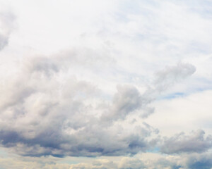 Cumulus thick clouds in sunny summer day, atmosphere background