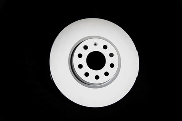 Car brake discs on a black background, isolate. Disc brake system, effective braking, close-up