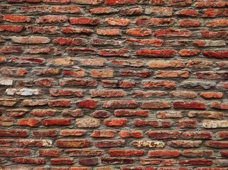 Red brick wall. Texture of old dark brown and red brick wall panoramic backgorund.old red brick wall texture background.red brick wall texture grunge background.Old red brick wall background.