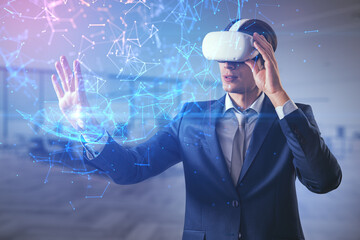 Attractive young european businessman in VR glasses using global polygonal interface on blurry office interior background. Metaverse and augmented reality concept. Double exposure.