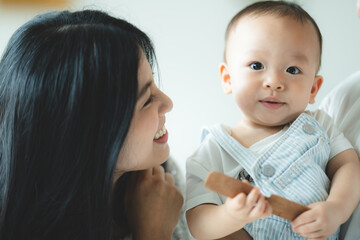 Big family with many generation of people are meeting at home. Grandmother and Grandfather with Father and Mother having relax with Children daughter group, smile bonding and happy