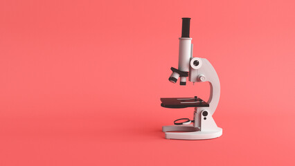 Metal microscope on pink base