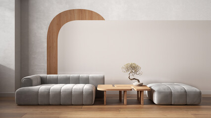 Elegant living room close up in white tones, modern sofa and pouf, wooden side table with bonsai, concrete walls with decors. Parquet floor. Copy space. Contemporary interior design