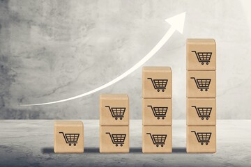 Wooden cubes with shopping cart. Business Marketing Strategy