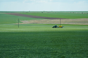 herbicide. equipment that weeds the crop against pests. photo during the day. agriculture.