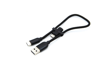 USB cable with adapter to Micro USB isolated on white background.