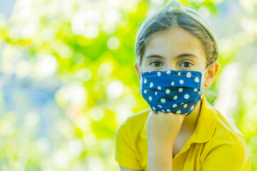 Little girl with mask