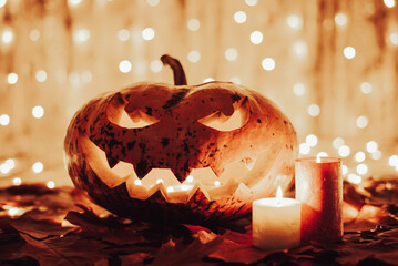 Halloween with two candles with bright light behind. Halloween concept