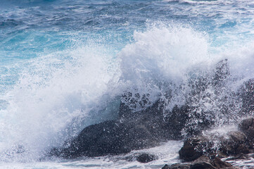 Abstract blue sea water with white wave for background.