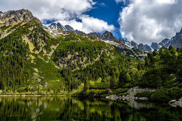 Fototapeta na wymiar Beautiful mountain lake landscape. Popradske Pleso, Tatra National Park, Slovakia.