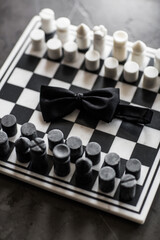 Wedding tie of the groom on a chessboard
