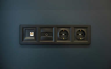 Black sockets on the wall
