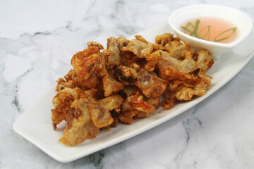 Chicharon Bulaklak or deep fried pork ruffle fat