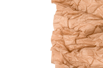 Fototapeta na wymiar Wrapping kraft paper or baking parchment isolated on white background with copy space. Sustainable packaging concept, wrapped paper as background. Selective focus