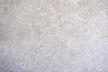 artistic plaster on a gray and white wall. Repairs. elements of wall decor. copy space. texture. background.