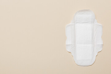 Women hygiene products or sanitary pad on colored background. Pastel color. Closeup. Empty place for text. Female daily hygiene