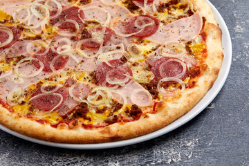 tasty italian pizza on wooden background