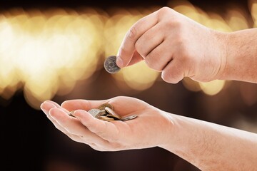 Men hand giving money to poor or homeless people poverty beggar. A sign for help