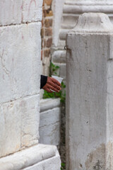 Hand of a man with a glass of coffee