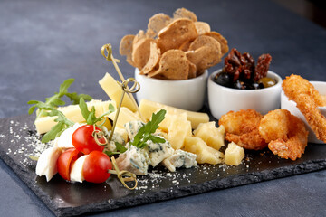 cheese plate with vegetables and fried shrimps