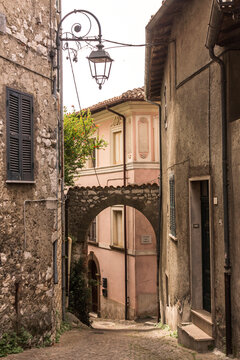 street in old town of Ceccano with castle