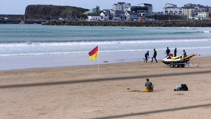 Beach Warning Flags to indicate the sea hazard on a sandy beach