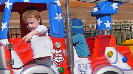 Children enjoying the fun rides at Curry’s Barry’s Amusements Portrush in N Ireland 29-05-22