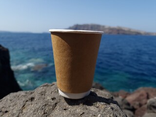 Fototapeta na wymiar cup on the beach
