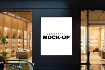 Mockup advertising LED Screen in front of women handbag shop