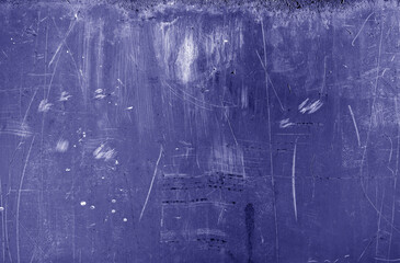 Grungy rusted metal wall surface in blue tone.