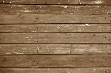 Wooden log house wall texture in brown tone.