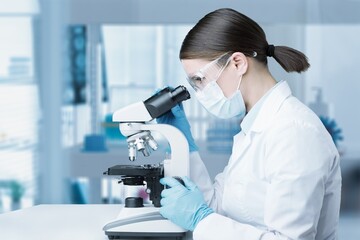Medical Development Laboratory: Scientist Looking Under Microscope,
