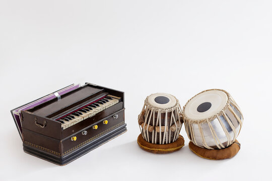 Portrait of Indian Traditional Classical Musical Instruments which consists of Tabla and Harmonium