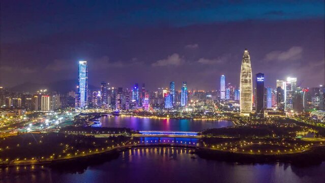 time lapse aerial view of modern cityscape of midtown of shenzhen at night
