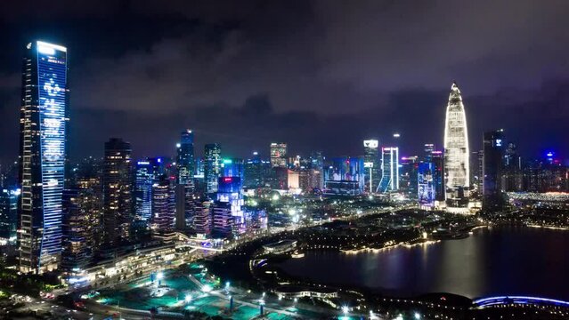 time lapse aerial view of modern cityscape of midtown of shenzhen at night
