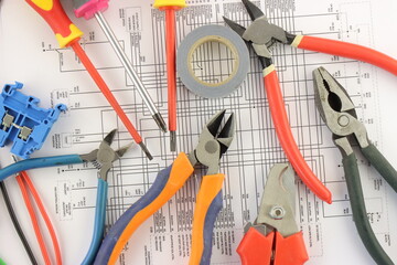 Mounting tools on the electrical diagram in close-up.